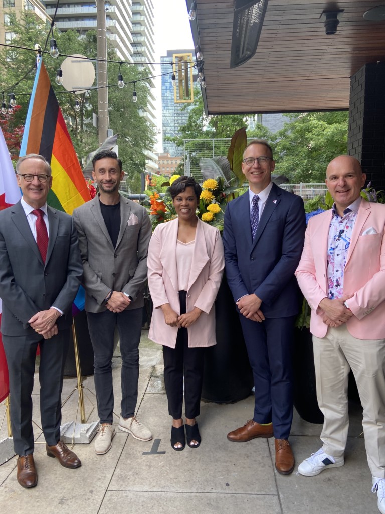 (L to R): The Honourable Rob Oliphant, MP Don Valley West, General Manager of The Anndore House (a Rainbow Registered accredited hotel), George Sovatzis, the Honourable Marci Ien, Minister for Women and Gender Equality of Canada, Darrell Schuurman, CEO and co-founder, Canada's LGBT+ Chamber of Commerce, and Randy Boissonnault, Minister of Tourism and Associate Minister of Finance.